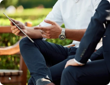 Two people looking at ipad